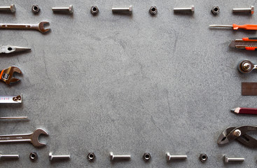 Hand tools isolated on a gray background. Copy space.