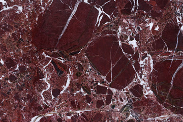 The finishing stone. The polished red marble. Texture.