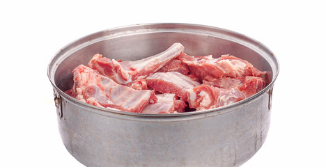 Raw spare ribs on white background