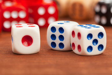 Dice on a wooden table. Concept for business risk.