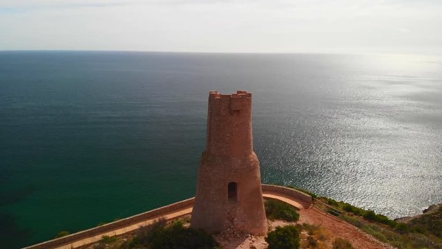 orre del Gerro tower. Ancient 16th century watchtower on the top of a cliff in Denia, Spain