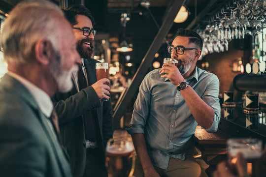 Getting to know my coworkers while drinking beer - Powered by Adobe