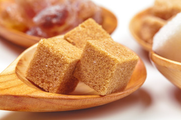 Different Kinds of Sugar in the Spoons close up