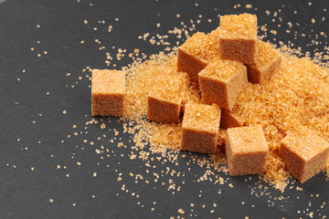Rock sugar on dark background close up