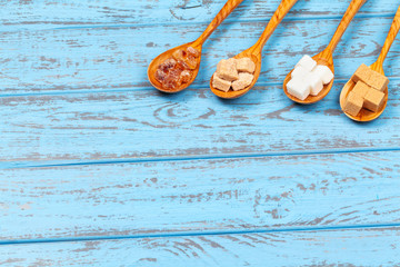 Different Kinds of Sugar in the Spoons close up