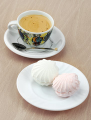 Falling vanilla marshmallow, traditional russian zephyr isolated on wooden background