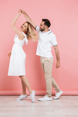 Full length of an attractive young couple standing together