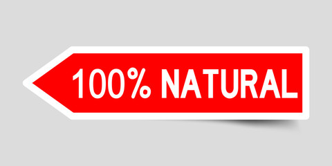 Sticker in red color arrow shape with word 100 percent natural on gray background