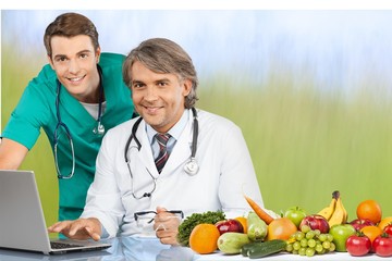 Medical doctor woman over Diet and health care background