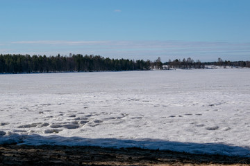 frozen lake in early spring