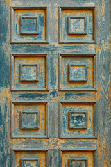 vintage wooden door and old white wall as background