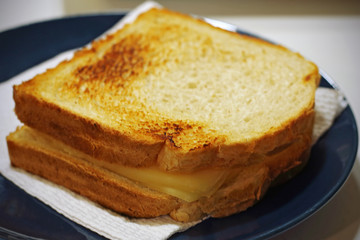 A delicious sandwich of ham and cheese