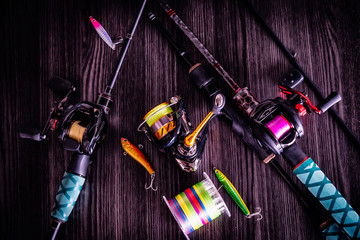 Fishing tackle spinning rods and casting   background.