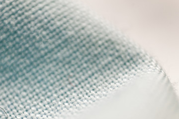 Textured background made with fabric mesh picked up in detail, close up