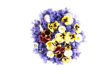 blue flowers cornflowers and yellow colored pansy bouquet  on white background. top view. copy space