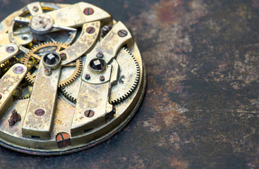 Business pocket watch, clock gears close-up, time mechanism with metal gears, top view