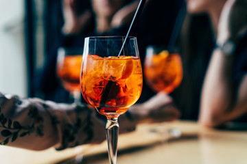 Aperol cocktail on table