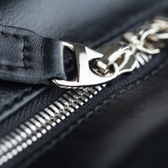 Close-up of leather products zipper opening. Leather goods.