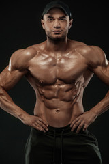 Obraz premium Bodybuilding competitions on the scene. Man sportsmen bodybuilder physique and athlete. Fitness motivation.