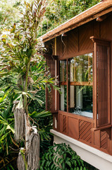 Asian luxury hotel  Bathroom with tropical garden window