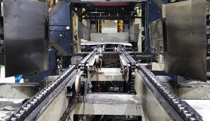 Chain and roller conveyor systems for transfer product to storage in factory