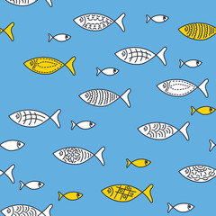 Fish silhouettes with decorated ornaments. Seamless pattern on a blue background. Vector.