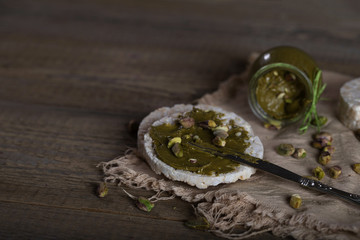 Pistachio nut butter creamed on a slice of rice crispbread.