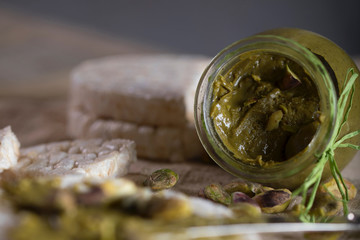 Pistachio nut butter creamed on a slice of rice crispbread.