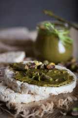 Pistachio nut butter creamed on a slice of rice crispbread.