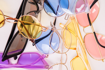 Set of different sunglasses isolated on white background
