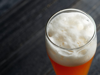 Wheat unfiltered beer in a glass close-up