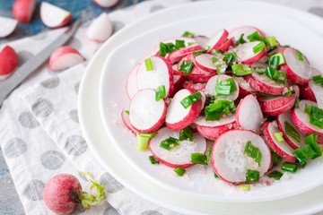 Salad with radish, green onions and pink salt