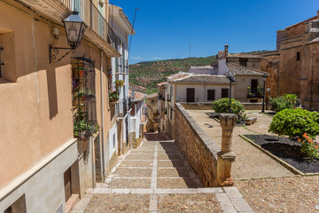Fototapeta na wymiar Old cobblestoned street in historic town Alcaraz, Spain