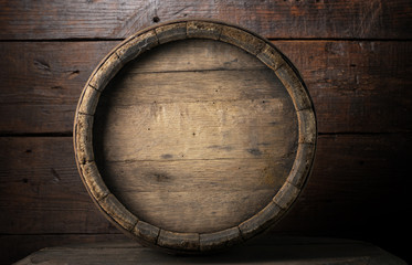 background of barrel and worn old table of wood