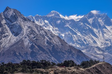 Himalayas with Everest peak on the center behind and road in the front