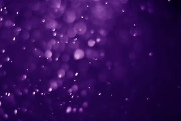 Fototapeta premium Bokeh purple proton background abstract