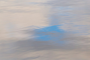 Reflection of the sky on the surface of the water