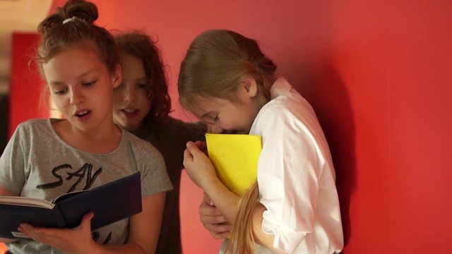 The girl at school is offended by classmates, physical abuse. Schoolgirl repels offenders and runs away, teen bullying