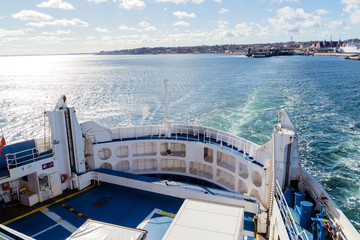 View over board of passenger ferry between Denmark and Sweden over blue sea and waves. Scandinavia...