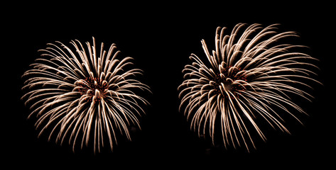 International fireworks festival display at night. Variety of colorful fireworks in holidays celebration isolated on black. Happy New Year Background. © tampatra