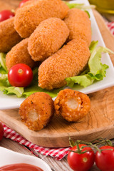 Supplì, italian fried rice balls. 