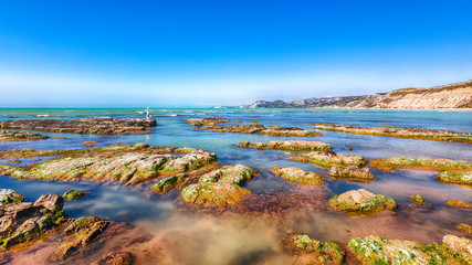 Colorful summer morning on the Giallonardo beach.