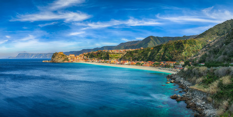 Beautiful seaside town village Scilla with old medieval castle on rock Castello Ruffo