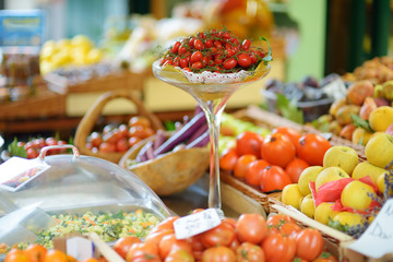 Assorted organic vegetables and greenery sold on a marketplace in Genoa, Italy