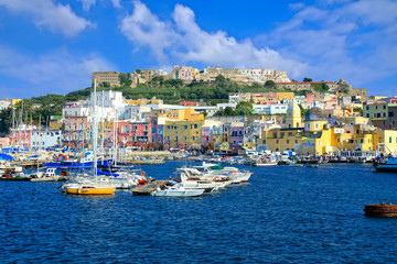 Boat filled port of the colorful island of Procida in the Bay of Naples, Italy