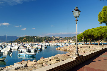Small yachts and fishing boats in marina of Lerici town, a part of the Italian Riviera, Italy.