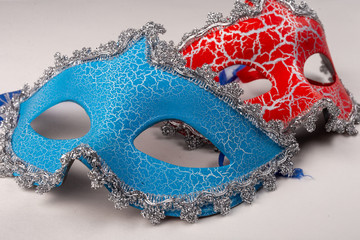 masquerade masks red and blue on a white background