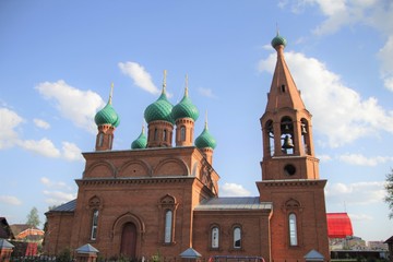 Fototapeta na wymiar Landscape overlooking the church in the village of Komsomolskoye , Russia