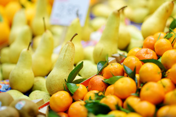 Assorted organic fruits sold on a marketplace in Genoa, Italy