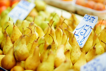 Assorted organic fruits sold on a marketplace in Genoa, Italy